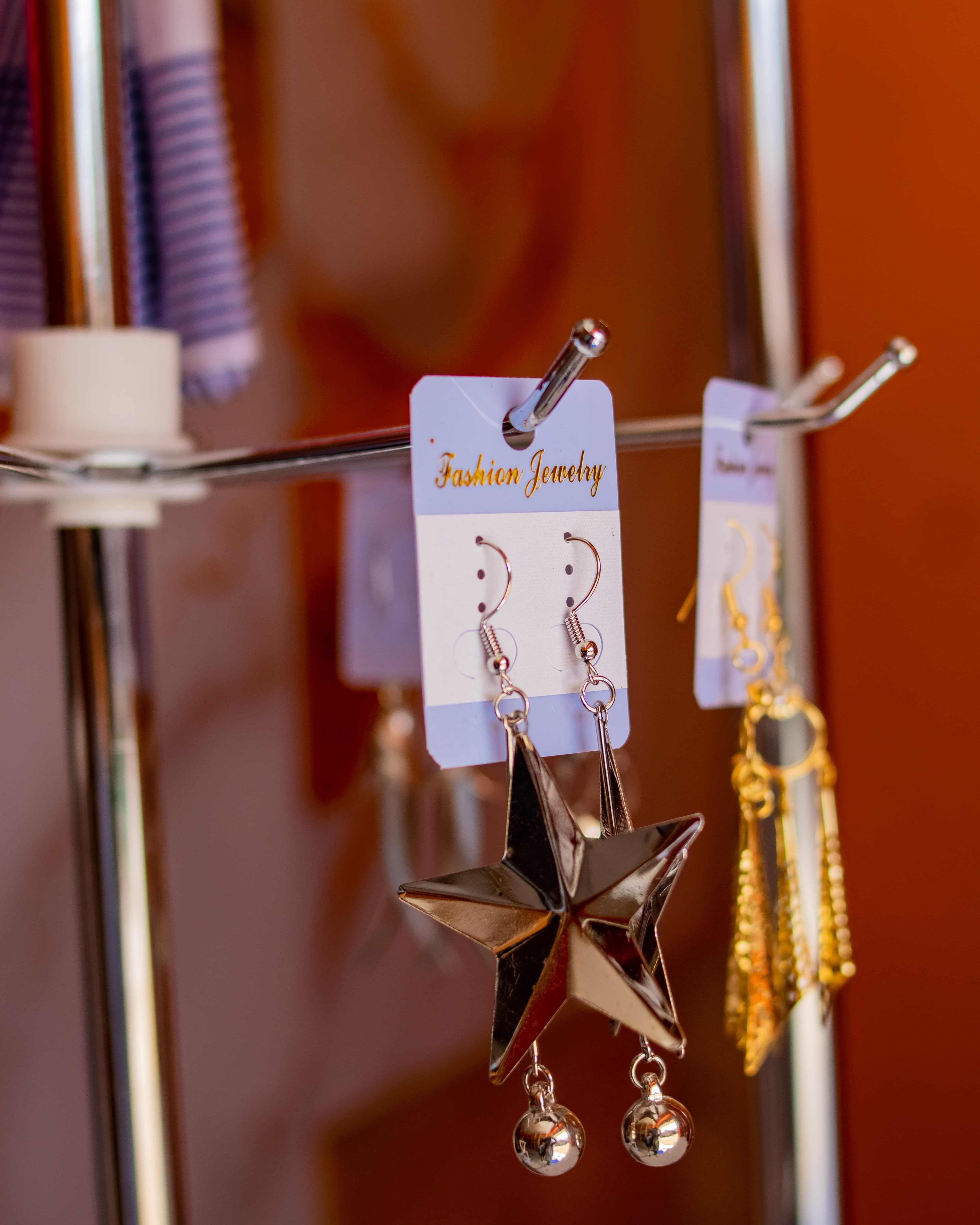 Silver-star dangling earrings