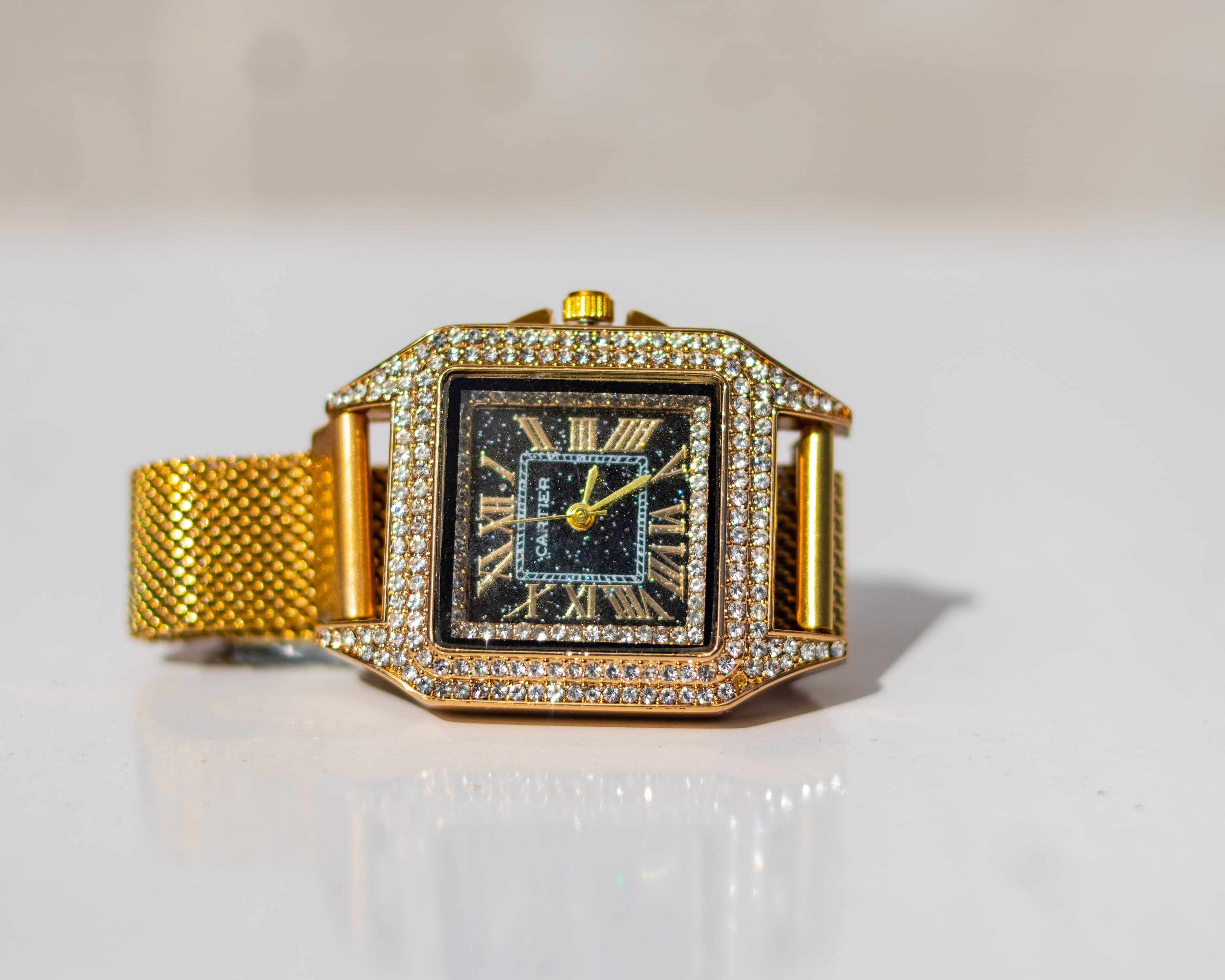 Gold-tone crystal-studded square wristwatch