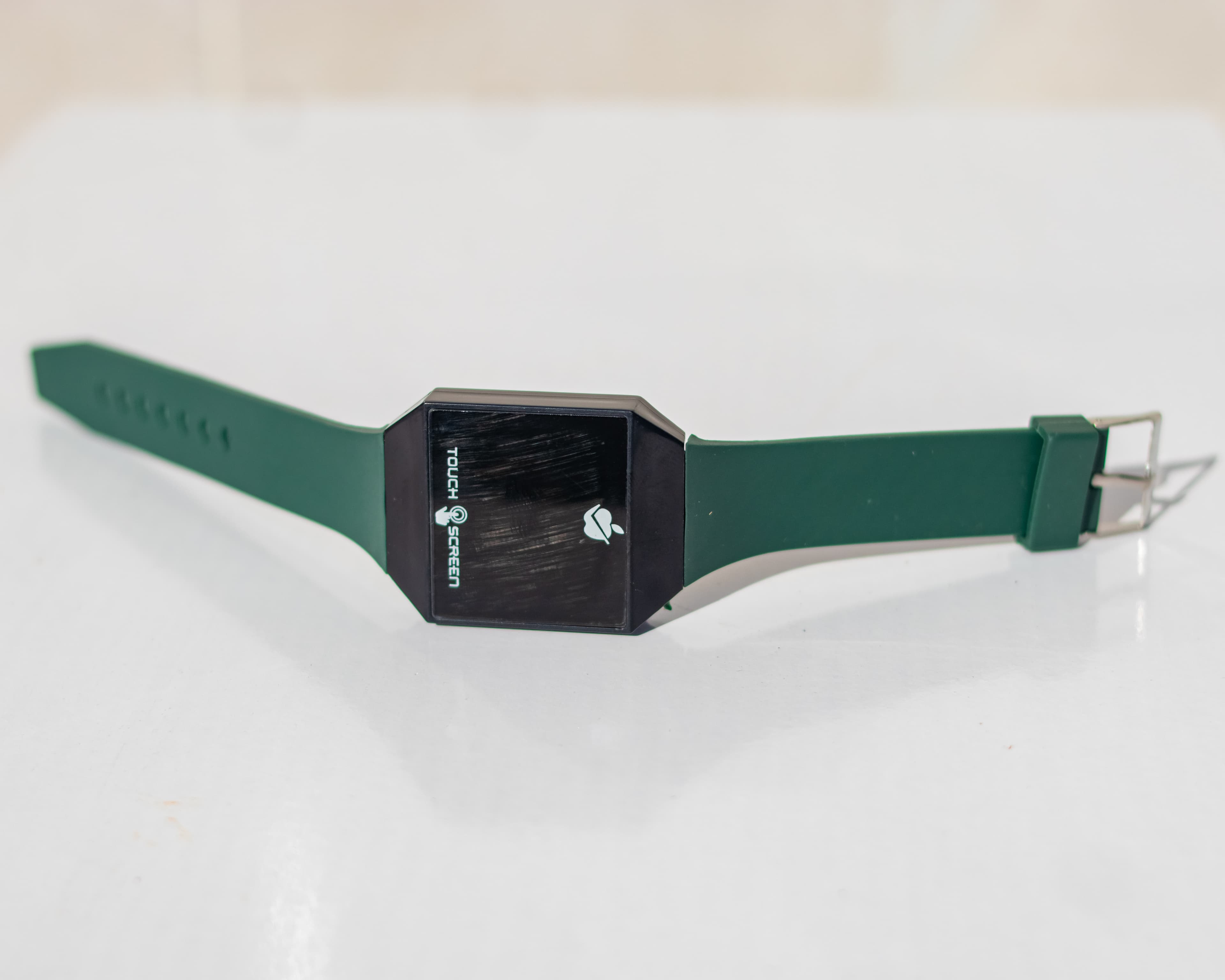 Square-shaped green-strap smart wristwatchvvvvvvvvv