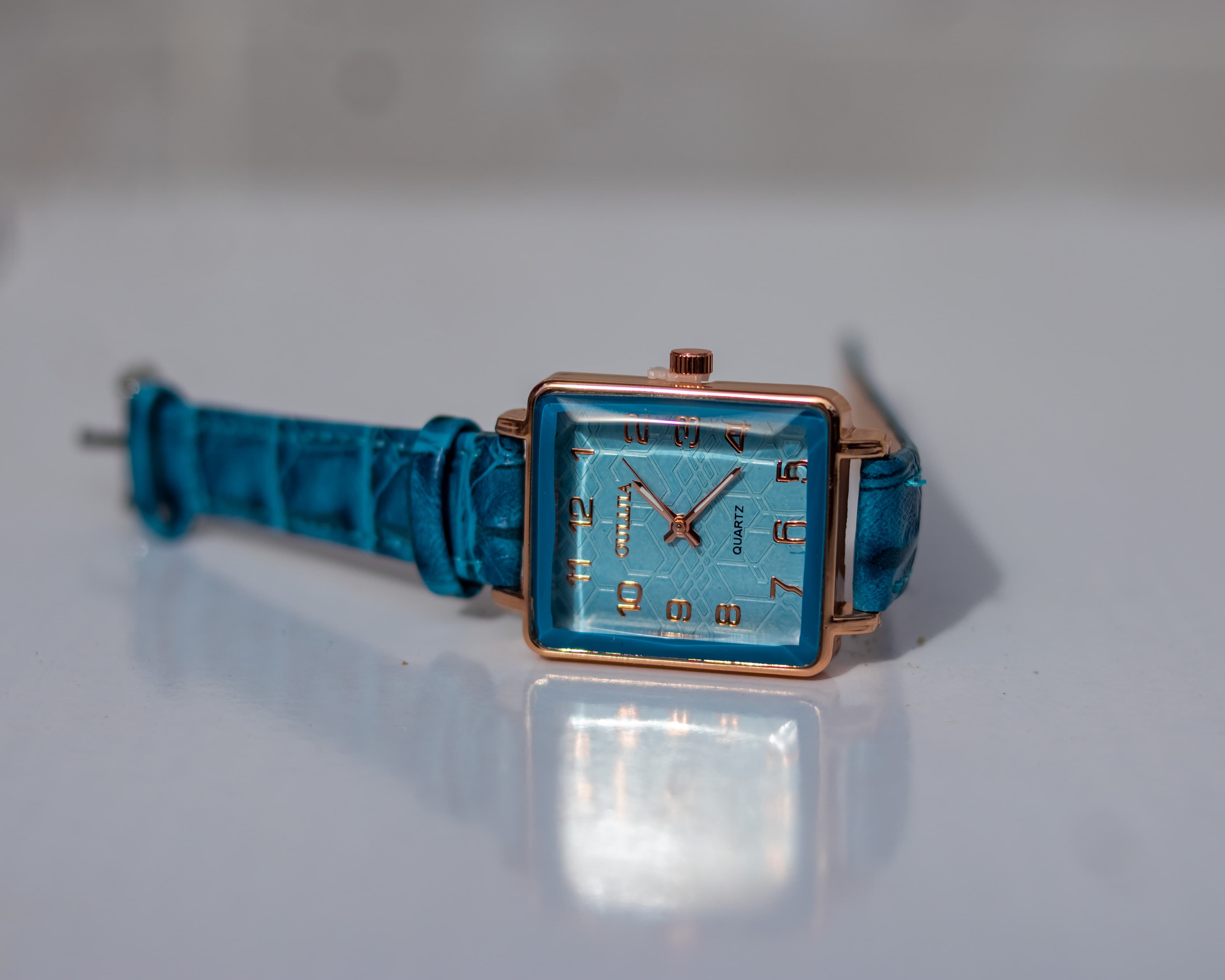 Stylish turquoise square wristwatch