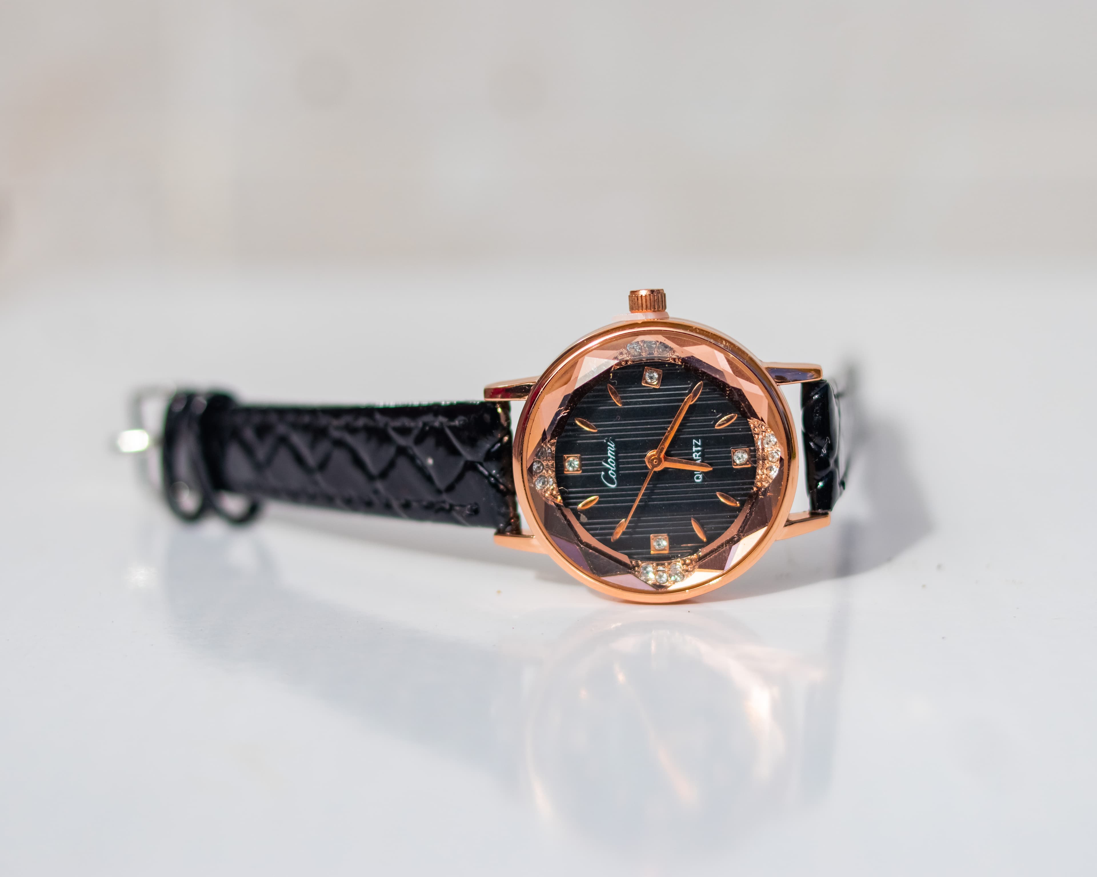 Black dial leather wristwatch